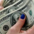 Dólar cai para R$ 5,60, e bolsa fecha em máxima histórica